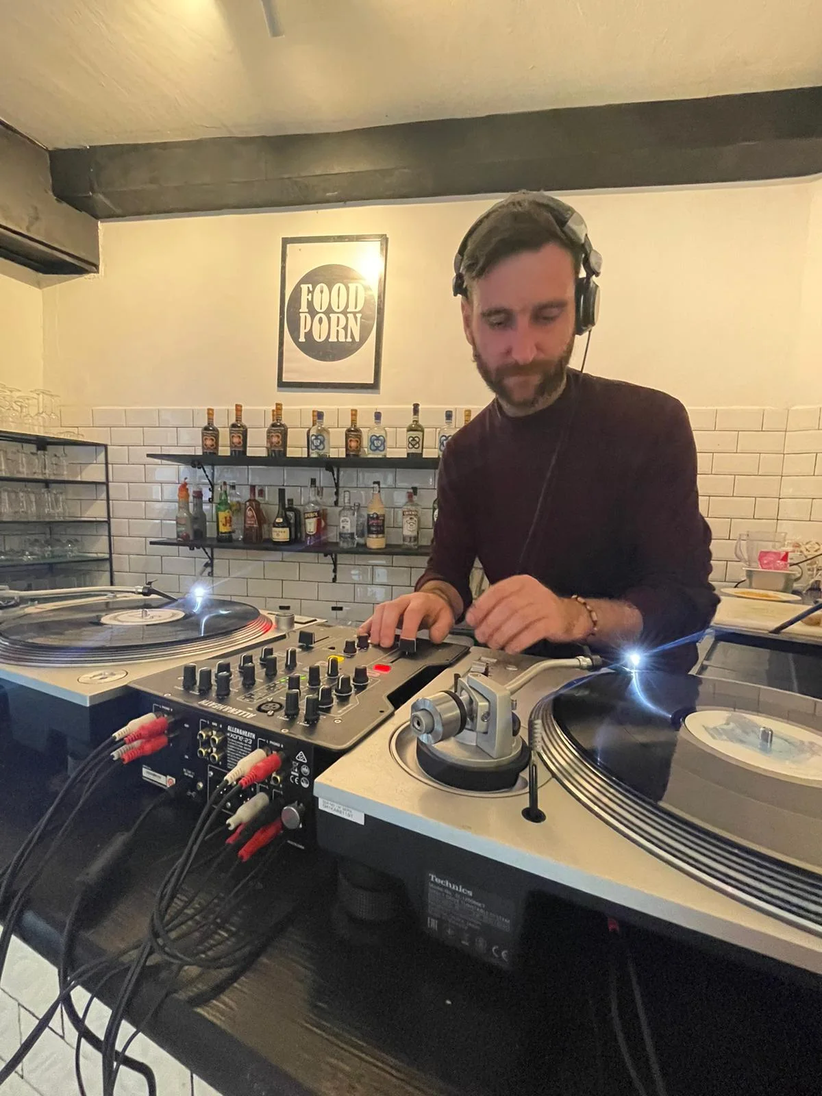 Daniel Williams DJing on vinyl turntables
